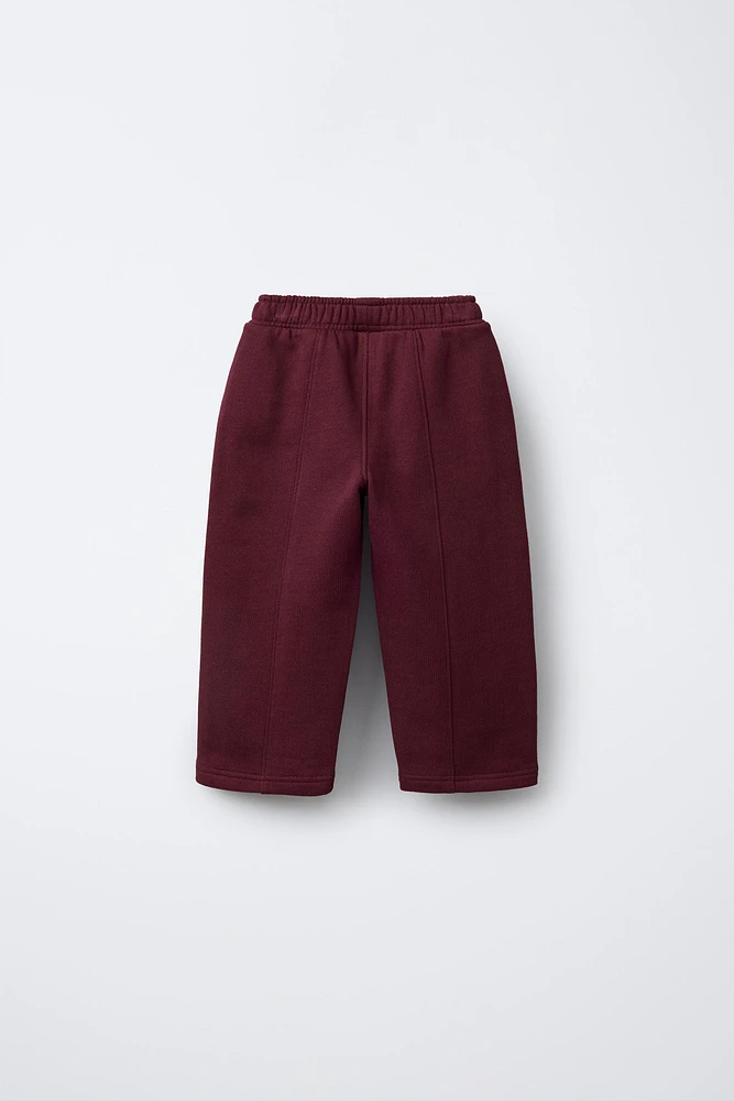 PLUSH TEXT STRAIGHT CUT PANTS