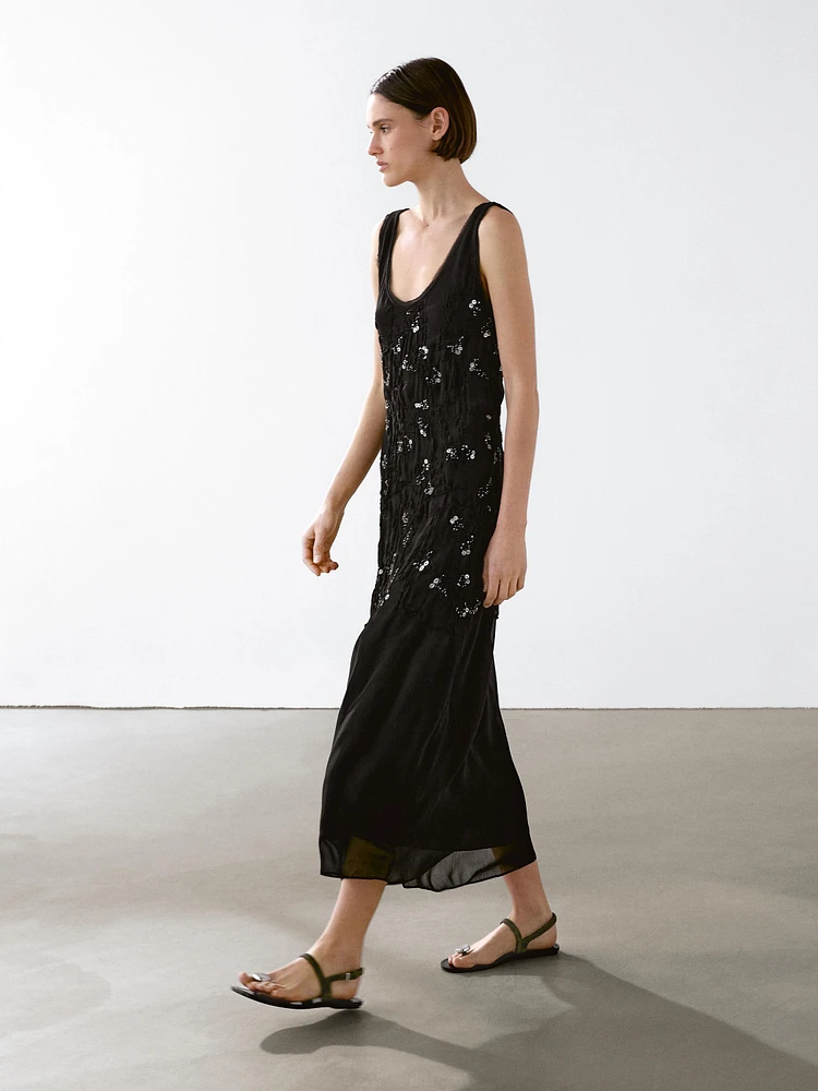 Long dress with beading