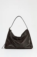 LARGE SOFT BUCKET BAG WITH METAL EYELETS