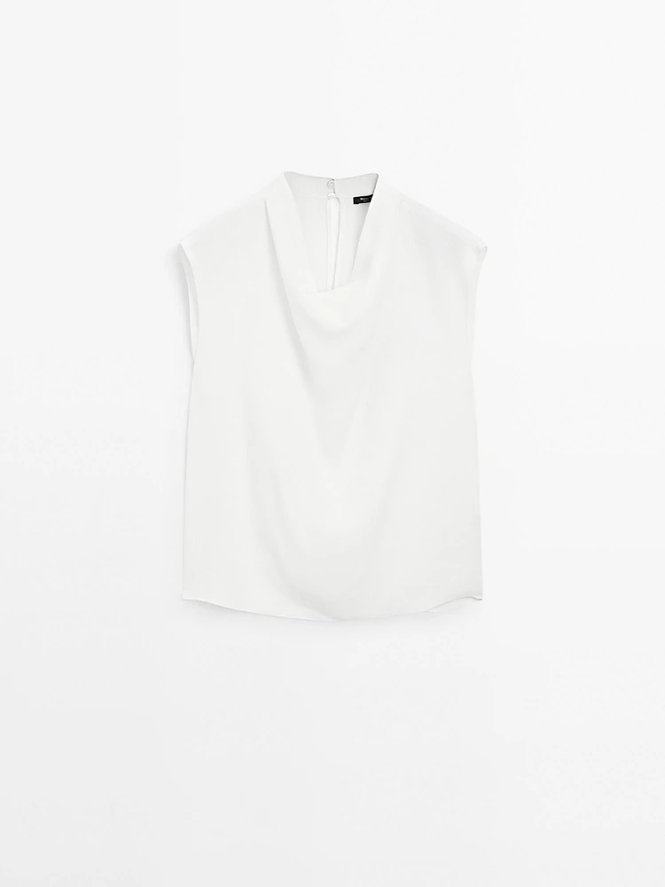 Blouse fluide à col drapé