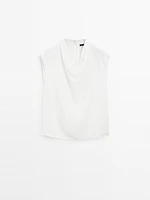 Blouse fluide à col drapé