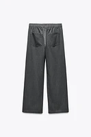 PANTALON À RAYURES AVEC CORDONS