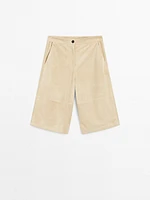 Bermuda long en cuir finition daim