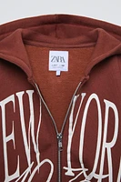 PRINTED ZIPPERED SWEATSHIRT