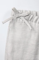 PANTALON JUPE-CULOTTE BRILLANT LACETS