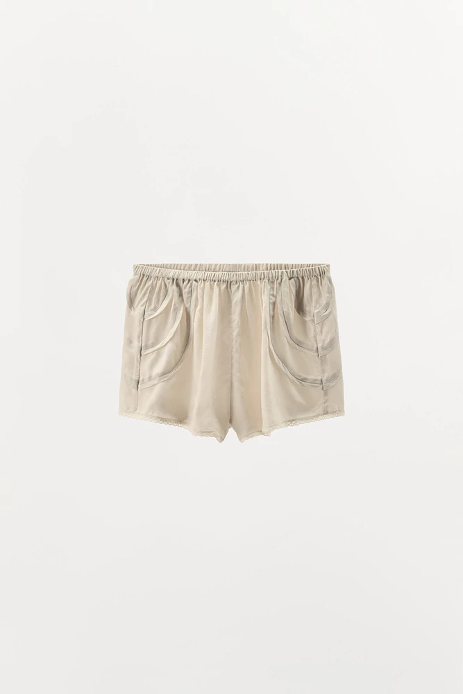PLEATED LACE SHORTS