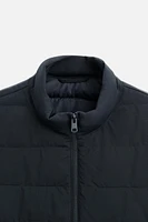 VESTE REMBOURRÉE EN MATIÈRES VARIÉES