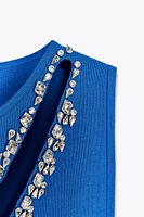 CUT OUT KNIT DRESS WITH JEWELS