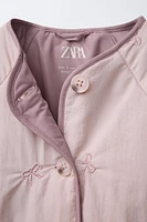 WATER REPELLENT PADDED JACKET WITH EMBROIDERED BOWS