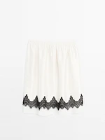 Contrast lace-trimmed skirt