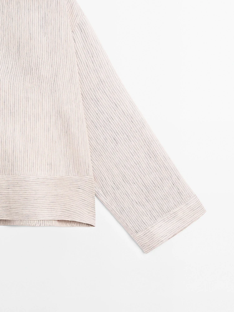 Striped satin shirt with wide hem