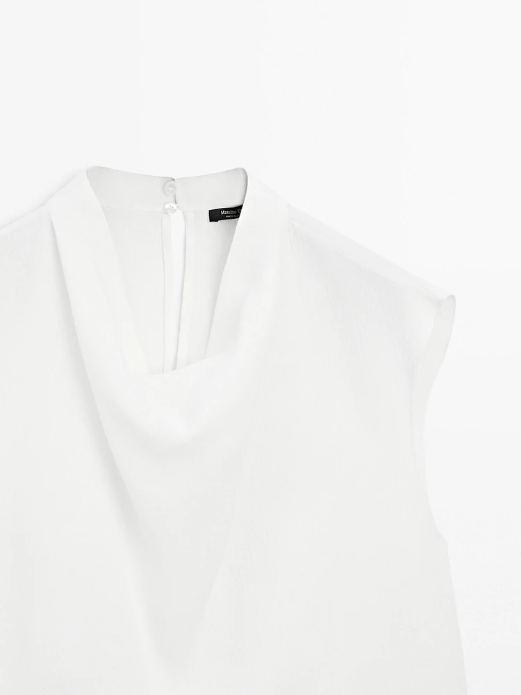 Blouse fluide à col drapé