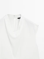 Blouse fluide à col drapé
