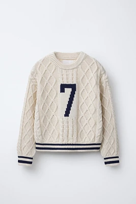 CABLE KNIT SWEATER