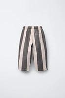 PANTALON EN MATIÈRES VARIÉES À RAYURES