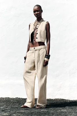 STRIPED PANTS WITH BRAIDED BELT