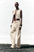 STRIPED PANTS WITH BRAIDED BELT