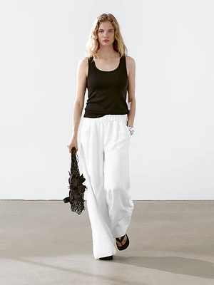 Pantalon large avec surpiqûres contrastantes