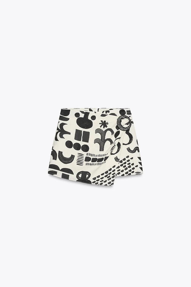 MINI-JUPE IMPRIMÉE BOUCLE