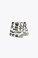 MINI-JUPE IMPRIMÉE BOUCLE