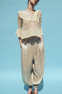 BLOUSE EN MAILLE POINTELLE À VOLANTS
