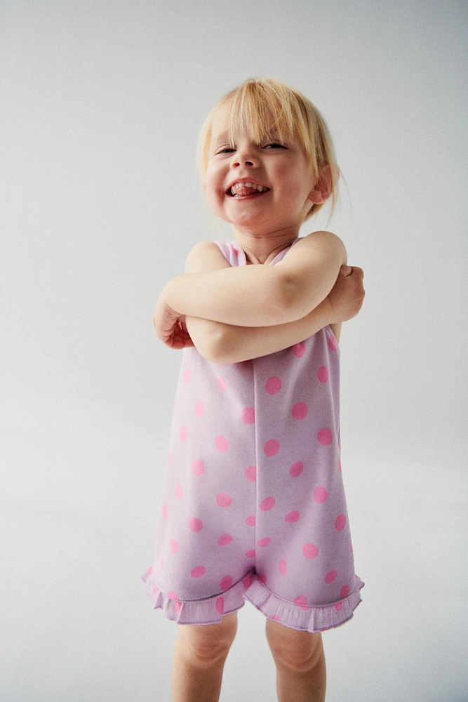 RUFFLED PRINT JUMPSUIT