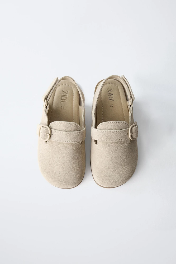 SABOTS EN CUIR