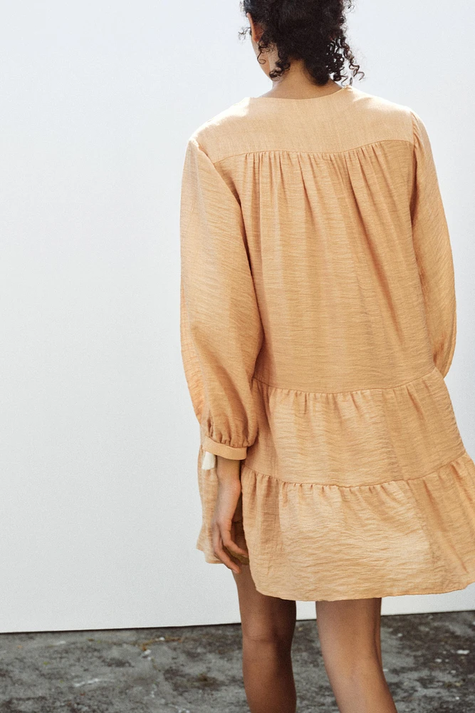 MINI BIB EMBROIDERED DRESS