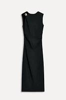 ROBE ASYMÉTRIQUE AJUSTÉE 50E ANNIVERSAIRE