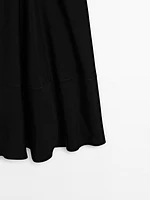 Robe longue fluide à col en V