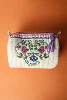 TROUSSE MATELASSÉE AVEC BRODERIES