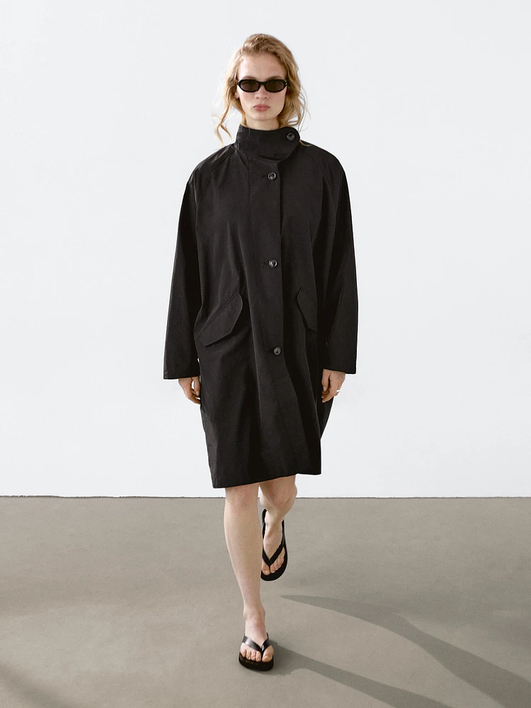 Flowing water-repellent fabric trench coat