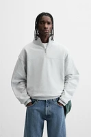 QUARTER-ZIP SWEATSHIRT