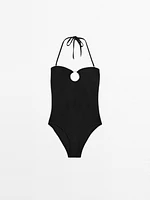 Bandeau swimsuit with metal piece detail