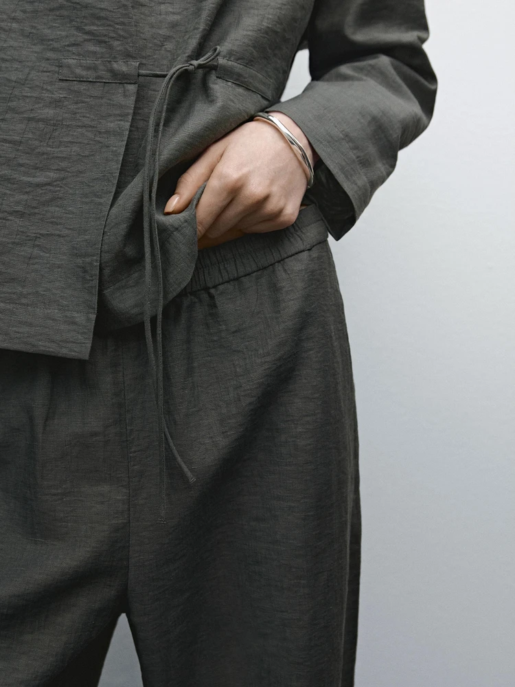 Suit trousers with elasticated waistband