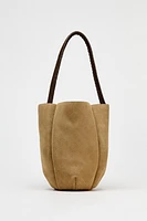 WOVEN SPLIT LEATHER FLOWER BUCKET BAG