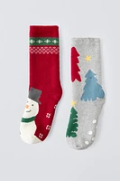 TWO-PACK OF NON-SLIP CHRISTMAS TREE AND SNOWMAN SOCKS