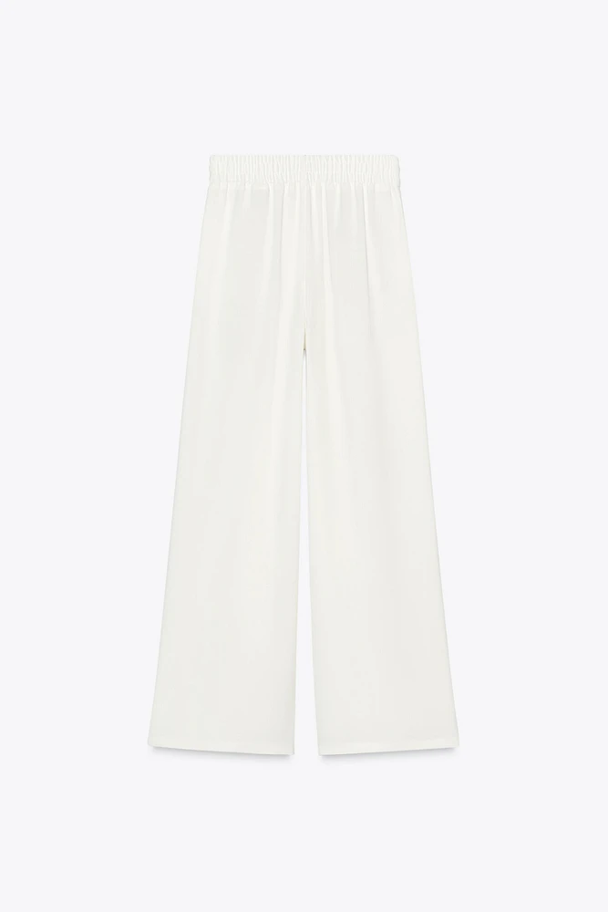 PANTALON EN CRÊPE À JAMBES LARGES
