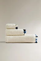 SERVIETTE DE BAIN POMPONS