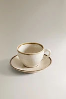 PORCELAIN TEACUP WITH ANTIQUE FINISH RIM