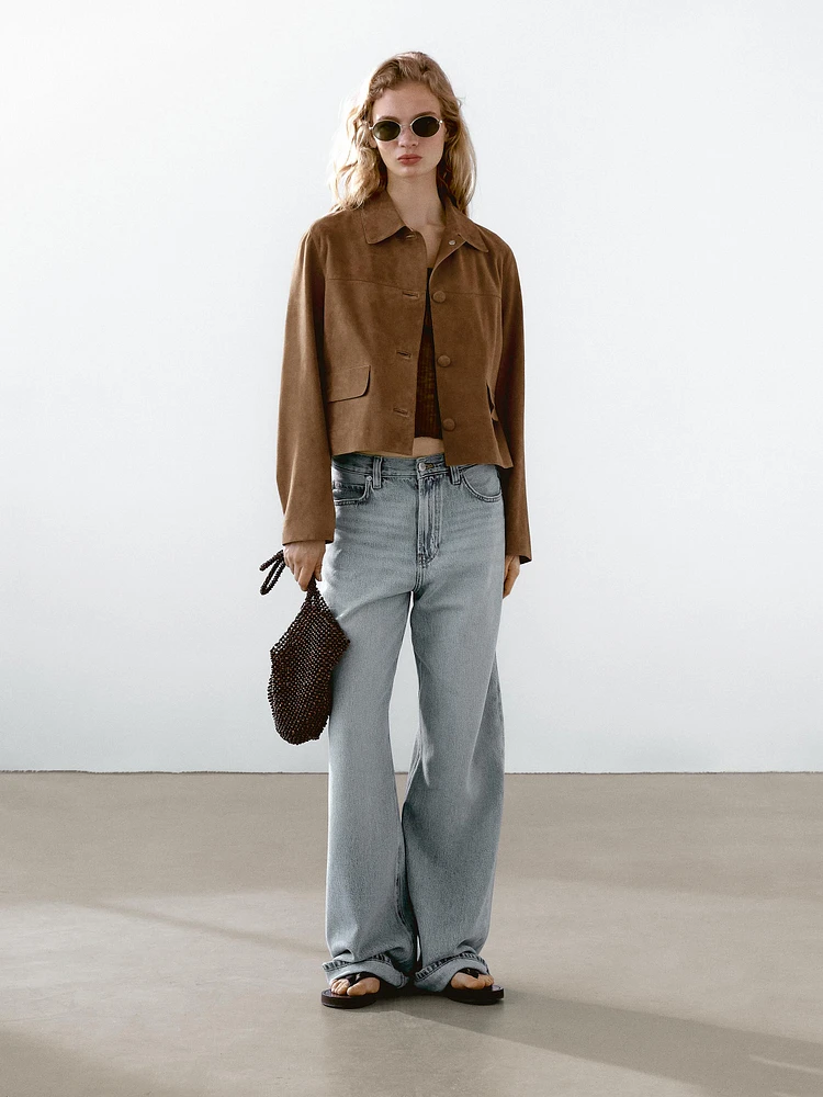 Blouson en cuir finition daim avec boutons doublés