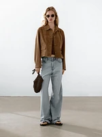 Blouson en cuir finition daim avec boutons doublés