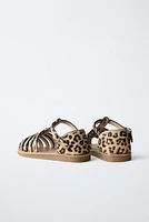 SANDALES STYLE PLAGE EN CUIR ANIMAL PRINT