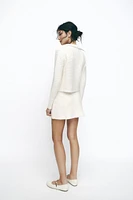 PEARL KNIT MINI SKIRT