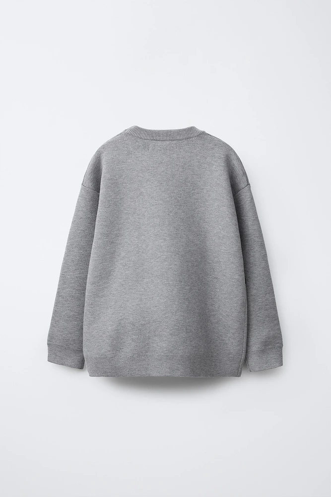 PULL EN MAILLE GRAFFITI