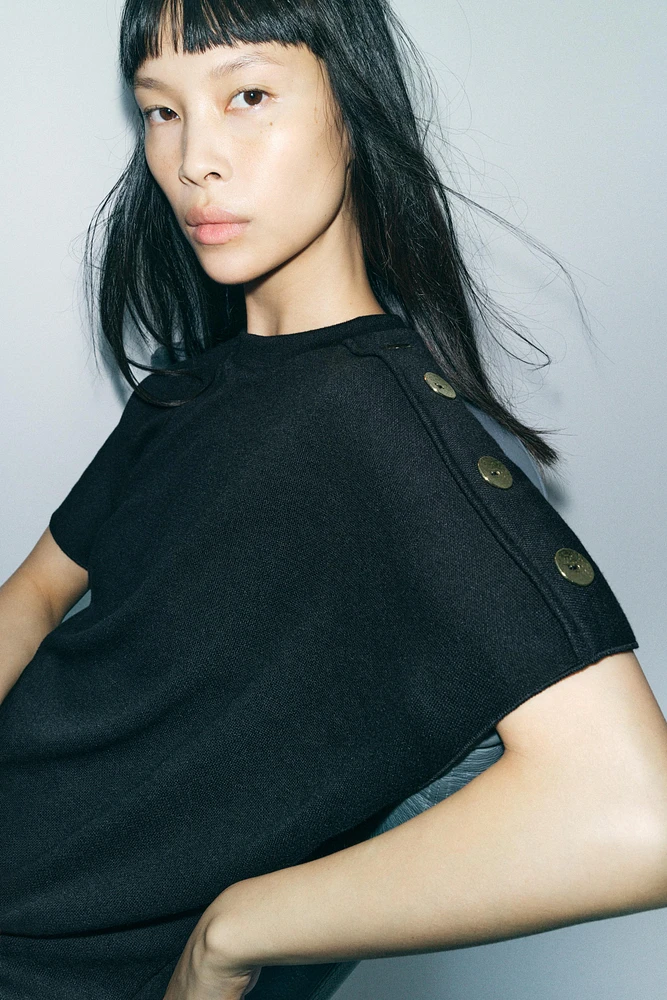 SOFT BUTTONED TOP