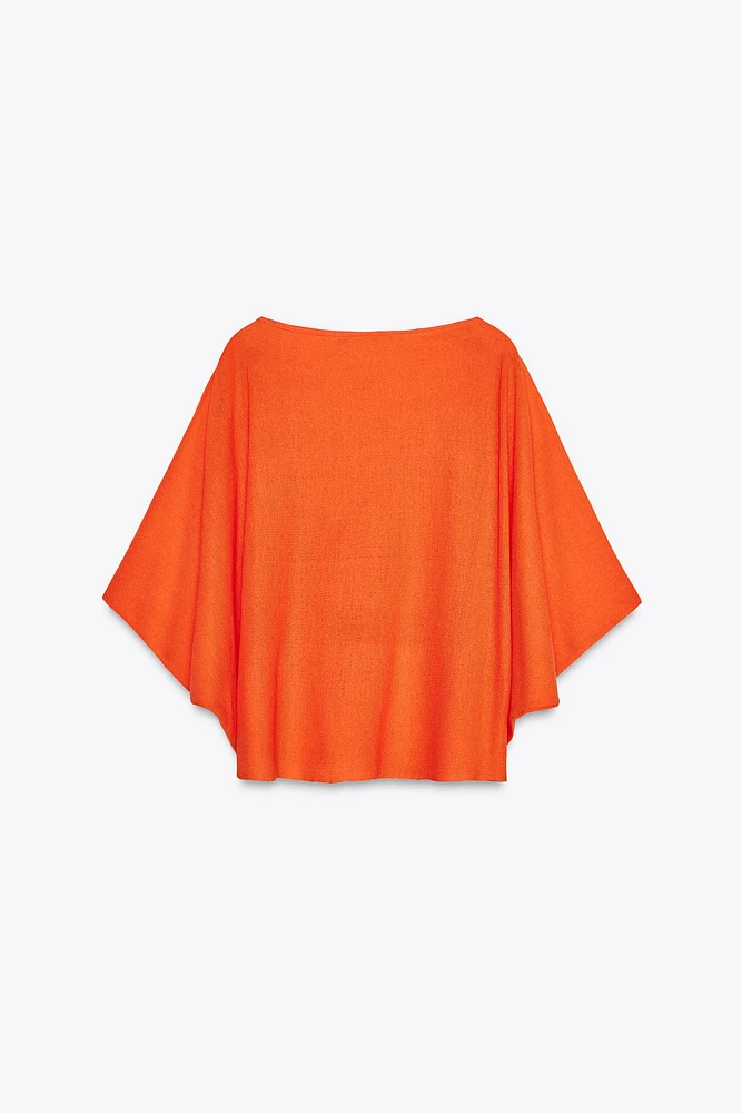 TOP CAPE EN MAILLE UNIE