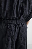 PANTALON EN COTON À EFFET PLISSÉ