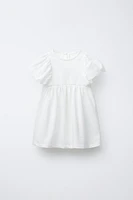 ROBE EN MATIÈRES VARIÉES À VOLANTS