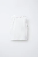 T-SHIRT POCHE SANS MANCHES